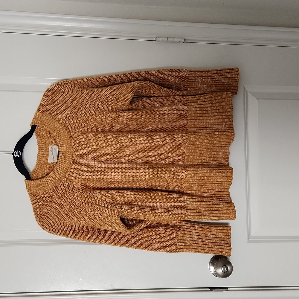 High neck sweater.